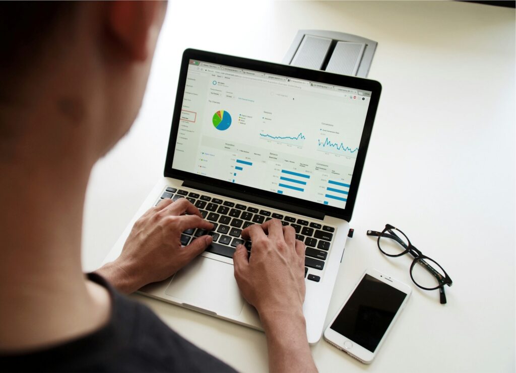 “Business owner setting up VPN on office desktop computer”