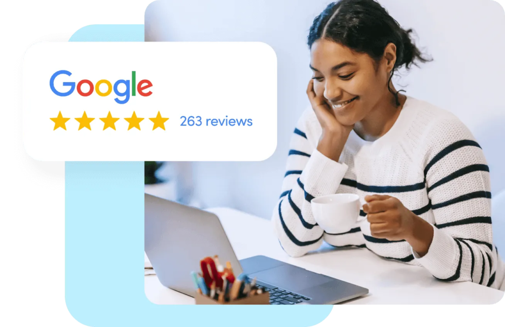 Business owner managing Google reviews online