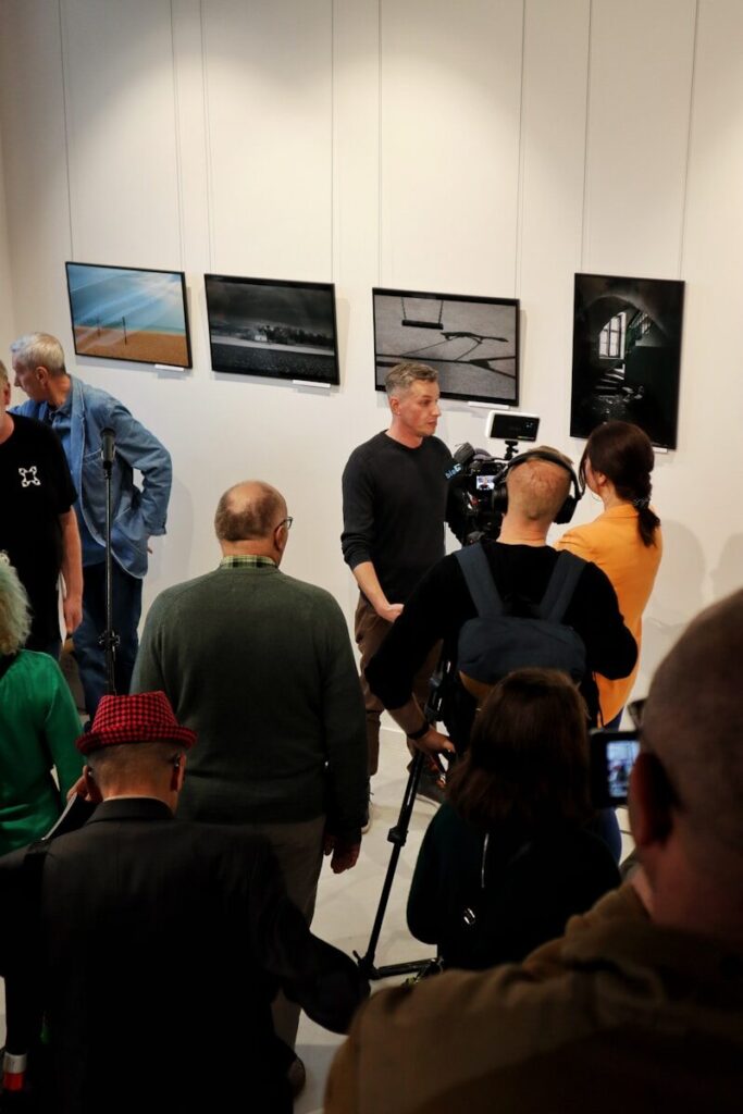 A group of people standing in a room